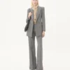 Blazer cu două rânduri de nasturi din țesătură Natté Blazer cu două rânduri de nasturi din țesătură Natté