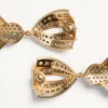 Cercei Pas Plus din metal, rășină, email și cristale Swarovski® Cercei Pas Plus din metal, rășină, email și cristale Swarovski®