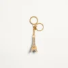 Chez Valentino Bag Charm cu inel pentru chei din metal, email și cristale Chez Valentino Bag Charm cu inel pentru chei din metal, email și cristale