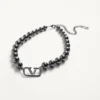 Colier metalic Vlogo Signature cu perle Swarovski®