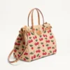 Geantă de cumpărături medie Valentino Garavani Antibes din rafie jacquard cu motiv Cherryfic Geantă de cumpărături medie Valentino Garavani Antibes din rafie jacquard cu motiv Cherryfic