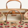 Geantă de cumpărături medie Valentino Garavani Antibes din rafie jacquard cu motiv Cherryfic Geantă de cumpărături medie Valentino Garavani Antibes din rafie jacquard cu motiv Cherryfic