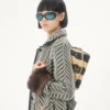 Geantă de umăr mică Valentino Garavani DeVain din rafie cu model ondulat Geantă de umăr mică Valentino Garavani DeVain din rafie cu model ondulat