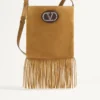 Geantă de umăr Valentino Garavani Nellcôte din piele de căprioară cu franjuri Geantă de umăr Valentino Garavani Nellcôte din piele de căprioară cu franjuri