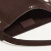 Geantă de umăr Valentino Garavani Nellcôte din piele de căprioară cu franjuri Geantă de umăr Valentino Garavani Nellcôte din piele de căprioară cu franjuri