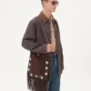 Geantă de umăr Valentino Garavani Nellcôte din piele de căprioară cu franjuri Geantă de umăr Valentino Garavani Nellcôte din piele de căprioară cu franjuri