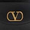 Geantă de umăr Valentino Garavani Vain din piele de vițel lucioasă Geantă de umăr Valentino Garavani Vain din piele de vițel lucioasă