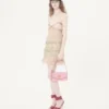 Geantă mică de umăr Valentino Garavani DeVain din țesătură jacquard cloqué. Geantă mică de umăr Valentino Garavani DeVain din țesătură jacquard cloqué.