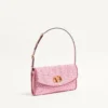 Geantă mică de umăr Valentino Garavani DeVain din țesătură jacquard cloqué. Geantă mică de umăr Valentino Garavani DeVain din țesătură jacquard cloqué.