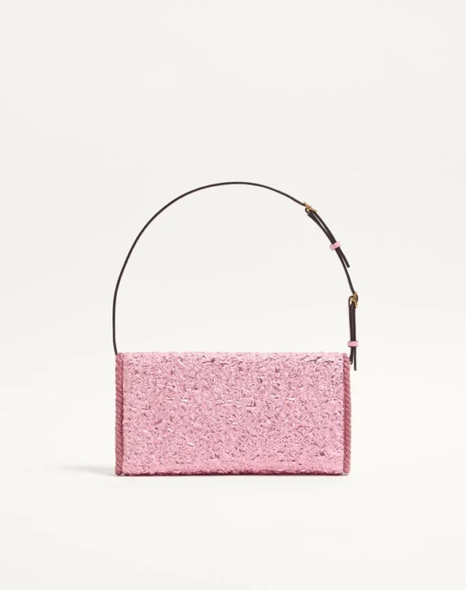Geantă mică de umăr Valentino Garavani DeVain din țesătură jacquard cloqué. Geantă mică de umăr Valentino Garavani DeVain din țesătură jacquard cloqué.