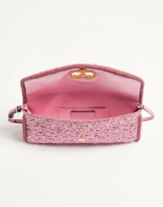 Geantă mică de umăr Valentino Garavani DeVain din țesătură jacquard cloqué. Geantă mică de umăr Valentino Garavani DeVain din țesătură jacquard cloqué.