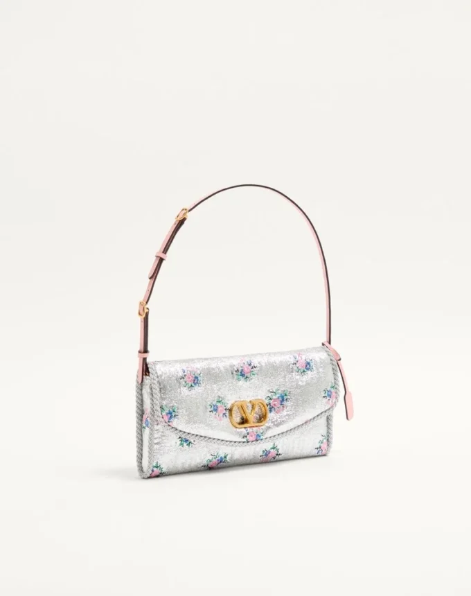 Geantă mică de umăr Valentino Garavani DeVain din țesătură jacquard florală lurex Geantă mică de umăr Valentino Garavani DeVain din țesătură jacquard florală lurex