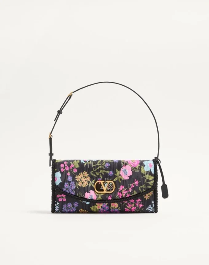Geantă mică de umăr Valentino Garavani DeVain din țesătură moiré cu imprimeu floral Geantă mică de umăr Valentino Garavani DeVain din țesătură moiré cu imprimeu floral