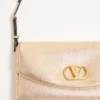 Geantă mică de umăr Valentino Garavani DeVain din piele nappa laminată Geantă mică de umăr Valentino Garavani DeVain din piele nappa laminată