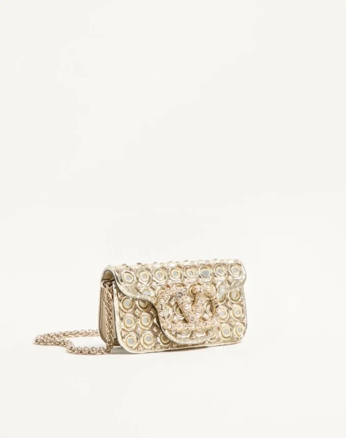 Geantă mică de umăr Valentino Garavani Locò brodată cu logo-ul Jewel Geantă mică de umăr Valentino Garavani Locò brodată cu logo-ul Jewel