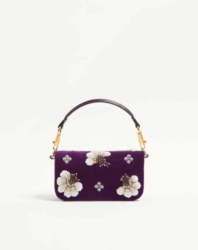 Geantă mică de umăr Valentino Garavani Locò brodată cu logo-ul Jewel Geantă mică de umăr Valentino Garavani Locò brodată cu logo-ul Jewel