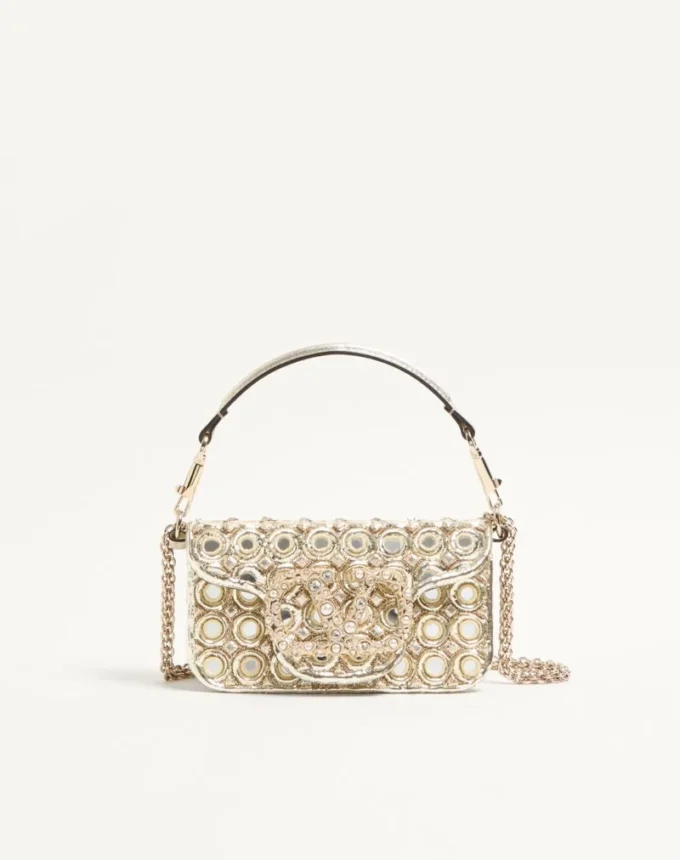 Geantă mică de umăr Valentino Garavani Locò brodată cu logo-ul Jewel Geantă mică de umăr Valentino Garavani Locò brodată cu logo-ul Jewel