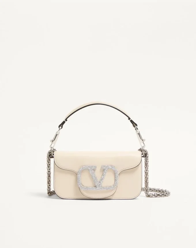 Geantă mică de umăr Valentino Garavani Locò cu logo bijuterie Geantă mică de umăr Valentino Garavani Locò cu logo bijuterie