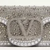 Geantă mică de umăr Valentino Garavani Locò cu strasuri Geantă mică de umăr Valentino Garavani Locò cu strasuri