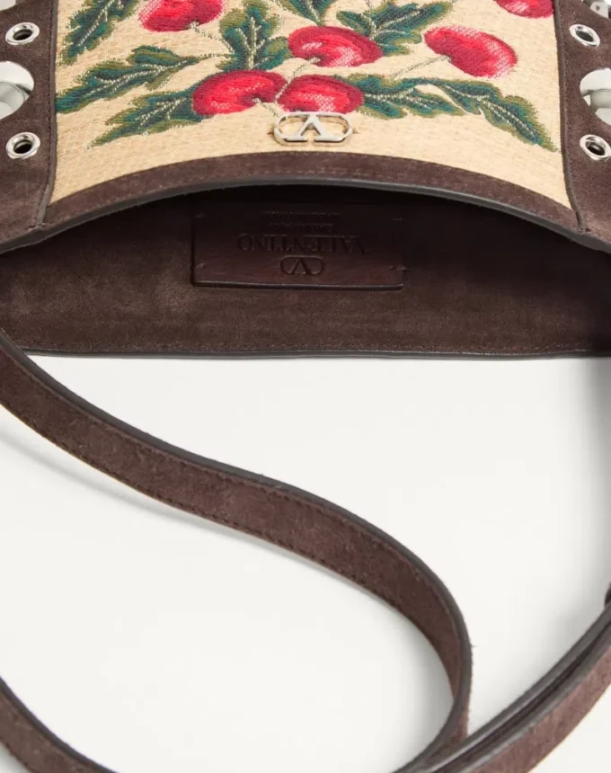 Geantă mică de umăr Valentino Garavani Nellcôte din rafie jacquard cu model Cherryfic Geantă mică de umăr Valentino Garavani Nellcôte din rafie jacquard cu model Cherryfic