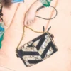 Geantă mică de umăr Valentino Garavani Panthea din piele de piton și piele întoarsă cu model chevron Geantă mică de umăr Valentino Garavani Panthea din piele de piton și piele întoarsă cu model chevron