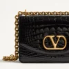 Geantă mică de umăr Valentino Garavani Vain din piele de crocodil Geantă mică de umăr Valentino Garavani Vain din piele de crocodil