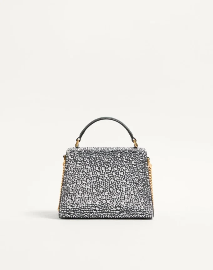 Geantă mini Valentino Garavani Vsling cu strasuri și logo bijuterie Geantă mini Valentino Garavani Vsling cu strasuri și logo bijuterie
