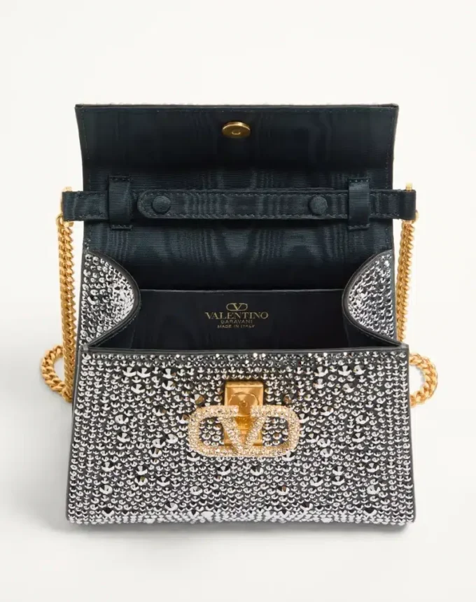 Geantă mini Valentino Garavani Vsling cu strasuri și logo bijuterie Geantă mini Valentino Garavani Vsling cu strasuri și logo bijuterie