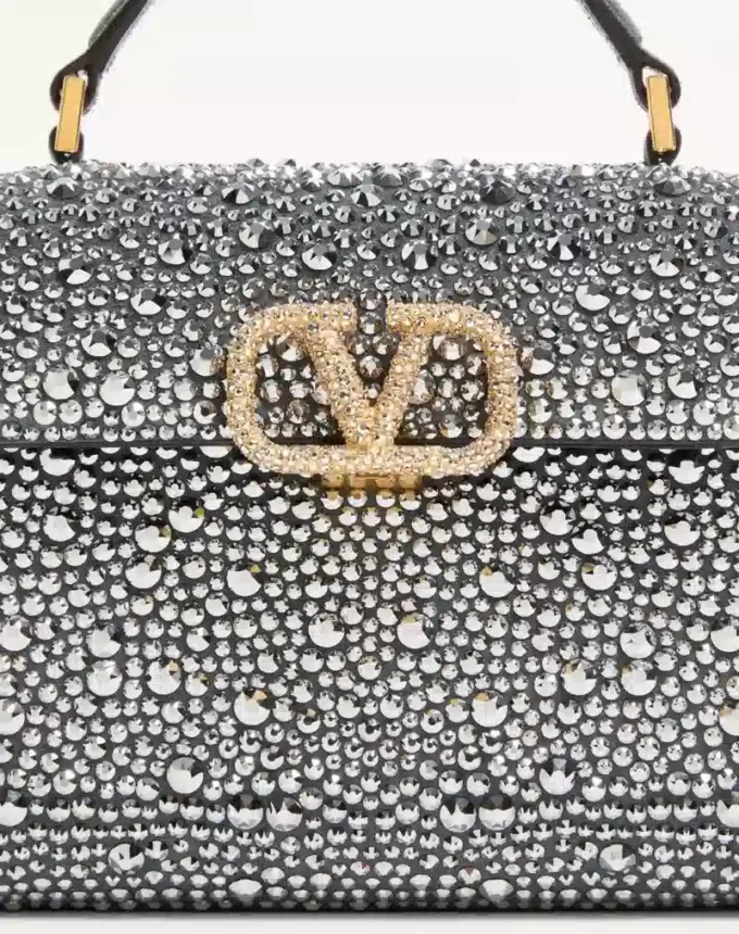 Geantă mini Valentino Garavani Vsling cu strasuri și logo bijuterie Geantă mini Valentino Garavani Vsling cu strasuri și logo bijuterie