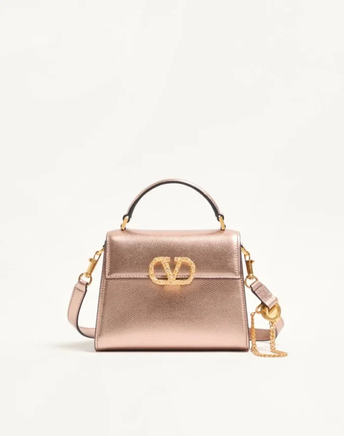 Geantă mini Valentino Garavani Vsling din piele de vițel laminată cu logo bijuterie Geantă mini Valentino Garavani Vsling din piele de vițel laminată cu logo bijuterie