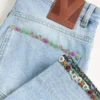 Pantaloni din denim brodați Pantaloni din denim brodați