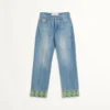 Pantaloni din denim cu ornamente jacquard Pantaloni din denim cu ornamente jacquard