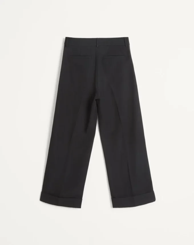 Pantaloni din lână cu manșete și benzi laterale din satin