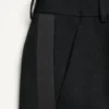 Pantaloni din lână cu manșete și benzi laterale din satin