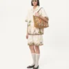 Pantaloni scurți din bumbac cu broderie florală și ornamente jacquard