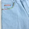 Pantaloni scurți din denim cu imprimeu floral pe tiv Pantaloni scurți din denim cu imprimeu floral pe tiv
