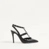 Pantofi cu baretă la gleznă Rockstud cu ținte tonale 100 mm Pantofi cu baretă la gleznă Rockstud cu ținte tonale 100 mm