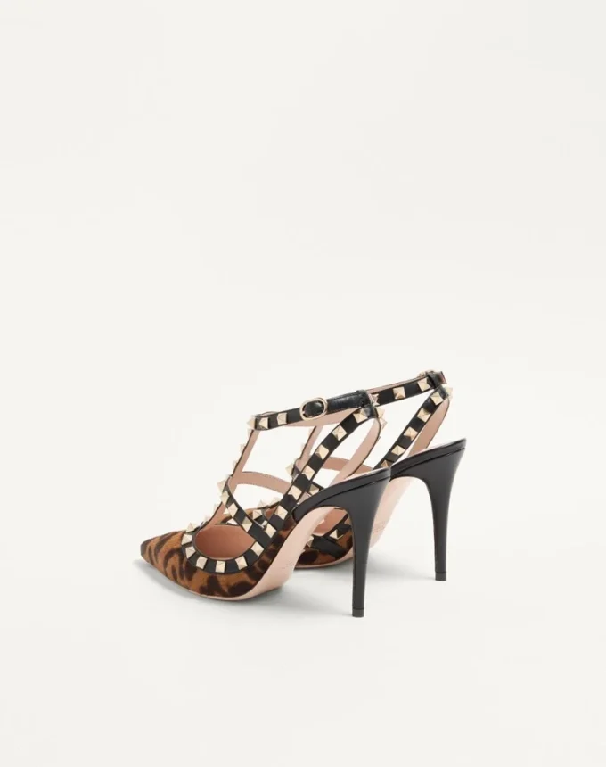 Pantofi cu toc Rockstud cu curele din piele de vițel cu efect de ponei 100 mm Pantofi cu toc Rockstud cu curele din piele de vițel cu efect de ponei 100 mm