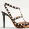 Pantofi cu toc Rockstud cu curele din piele de vițel cu efect de ponei 100 mm Pantofi cu toc Rockstud cu curele din piele de vițel cu efect de ponei 100 mm