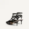 Pantofi cu toc Rockstud din piele lăcuită, cu curele și ținte asortate, 65 mm