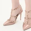 Pantofi cu toc Rockstud din piele nappa laminată 100 mm