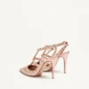 Pantofi cu toc Rockstud din piele nappa laminată 100 mm