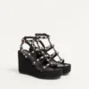 Sandale cu platformă și curea la gleznă Rockstud din piele de vițel 95 mm Sandale cu platformă și curea la gleznă Rockstud din piele de vițel 95 mm