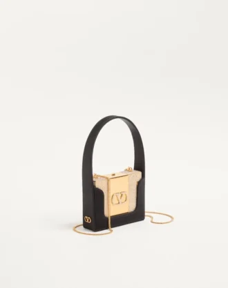 Valentino Garavani Minaumorphe Minaudière din metal cu cristale Swarovski® și husă din satin Valentino Garavani Minaumorphe Minaudière din metal cu cristale Swarovski® și husă din satin