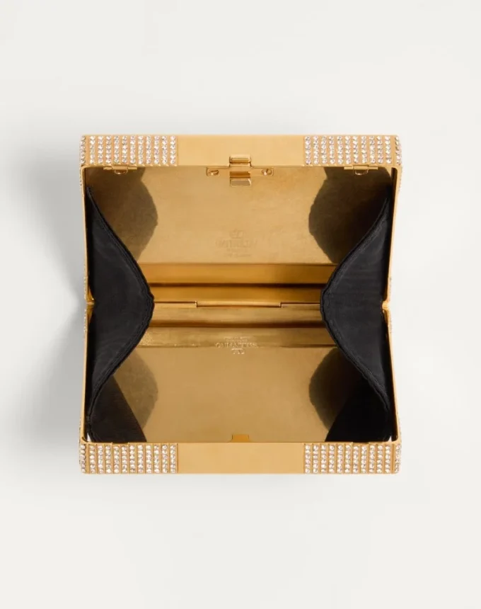 Valentino Garavani Minaumorphe Minaudière din metal cu cristale Swarovski® și husă din satin