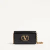 Valentino Garavani Vain Clutch Bag din piele de vițel lucioasă