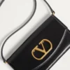 Valentino Garavani Vain Clutch Bag din piele de vițel lucioasă