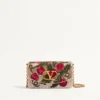 Valentino Garavani Vain Clutch brodat cu model Cherryfic